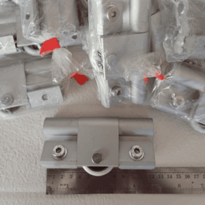 Rueda puerta corredera abisagrada